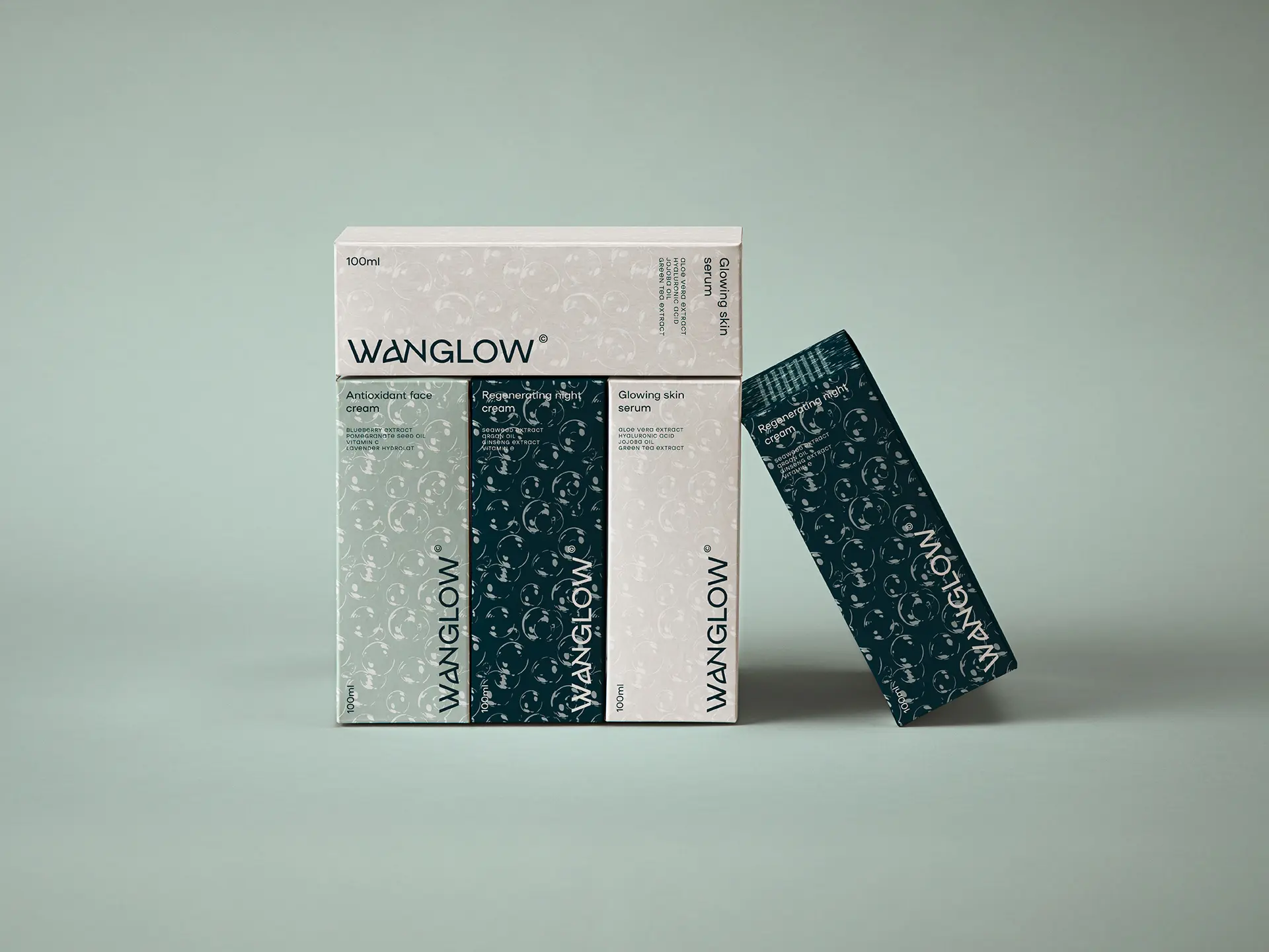 Packaging design system for Wanglow men's skincare brand showing full product line in branded boxes across two colorways